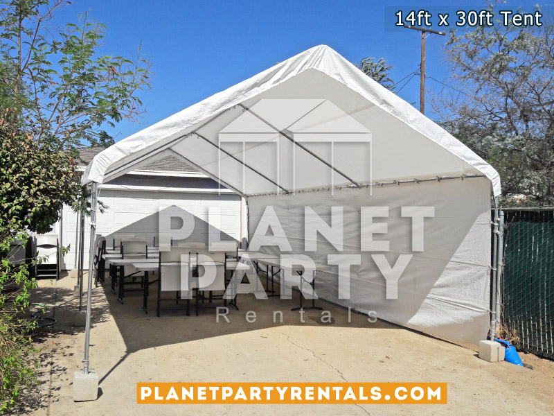 14ft x 30ft Tent with plastic chairs and rectangular tables 